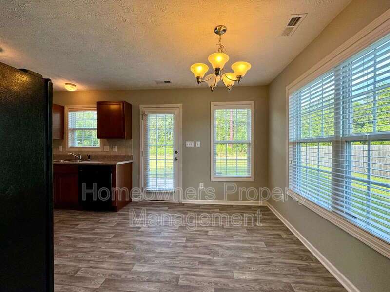 Charming 3-Bed Home with Hardwood Elegance & Cozy Fireplace in Raeford! property image