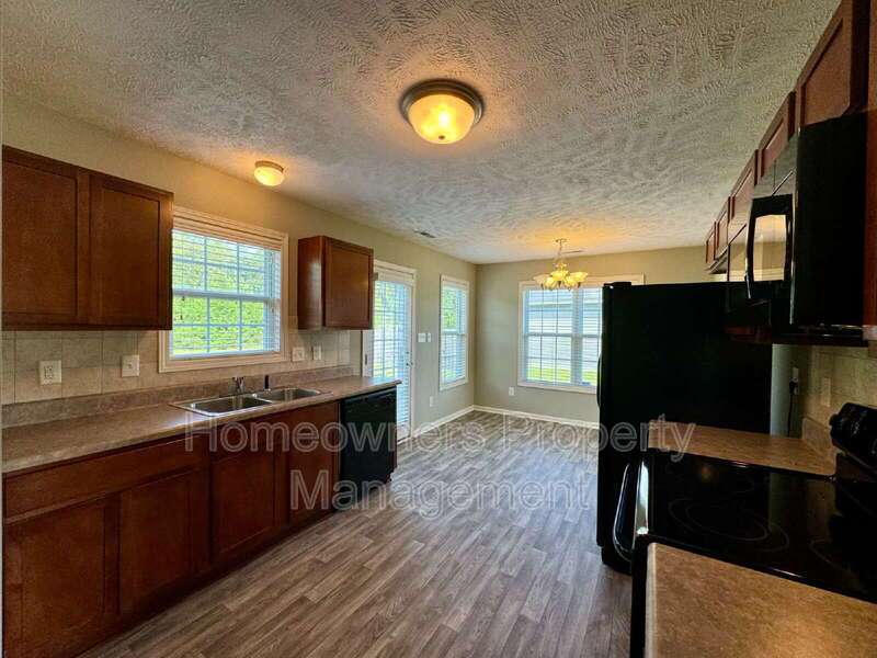 Charming 3-Bed Home with Hardwood Elegance & Cozy Fireplace in Raeford! property image